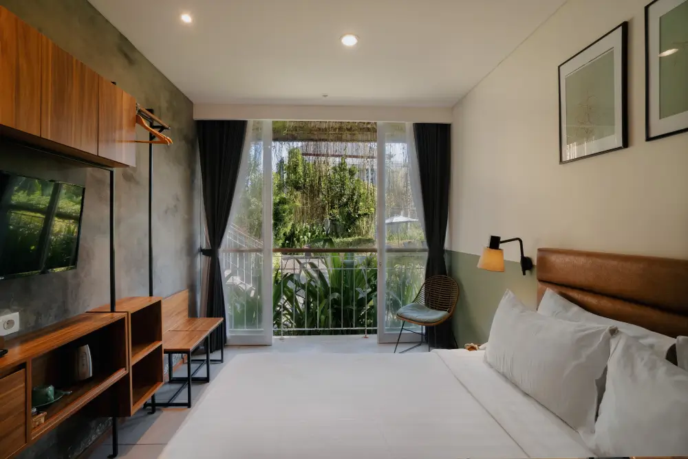 Superior Double Room with Lush Balcony View at Rimbun Canggu